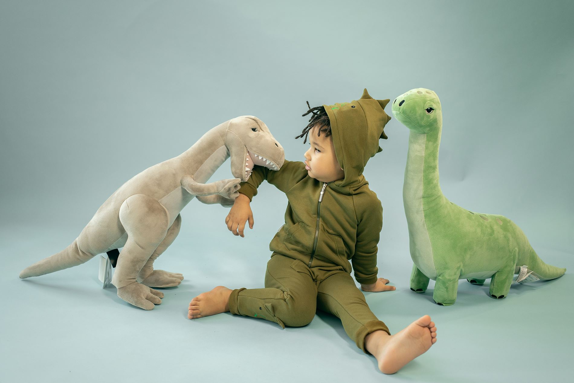 Dinosaurier beißt Kind